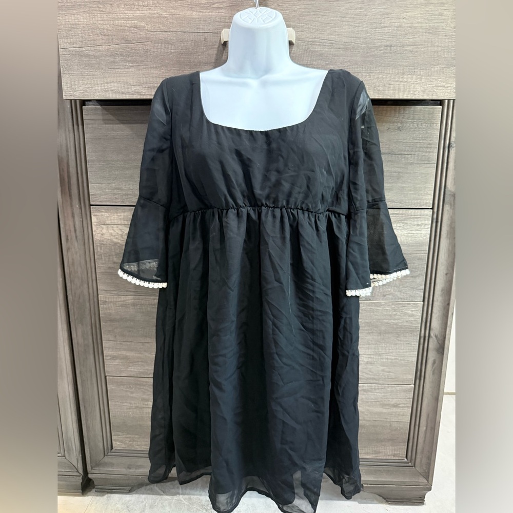 Elegant Black Dress with Pearl Accents